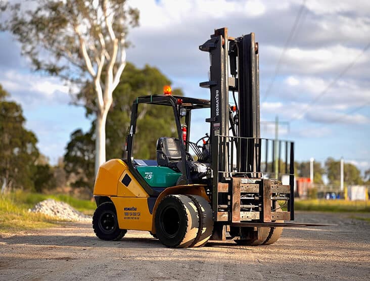 Forklift truck on construction site with outdoor background.