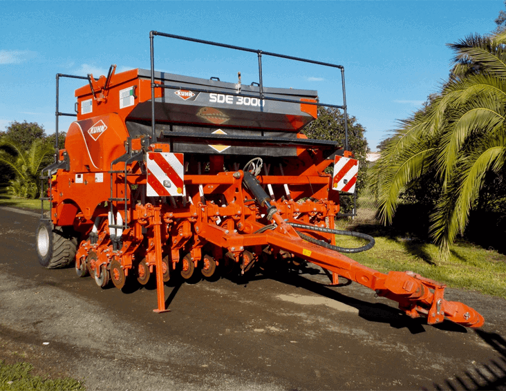 Seed drill machine for precise seeding and planting in agriculture. Ideal for commercial farming and.